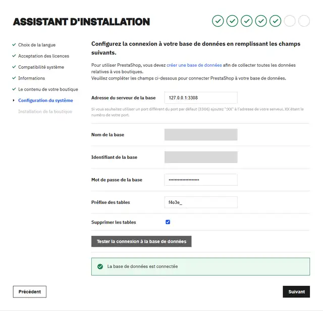 Écran de configuration de la base de données de PrestaShop 9.2.0 : adresse du serveur 127.0.0.1:3308, nom de la base et identifiant masqués, mot de passe, préfixe des tables f4o3e_, case Supprimer les tables cochée, et le message La base de données est connectée